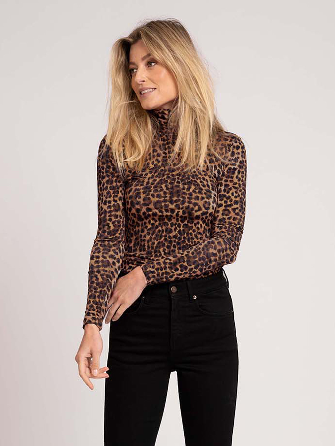  Fitted Leopard print top with turtleneck  
