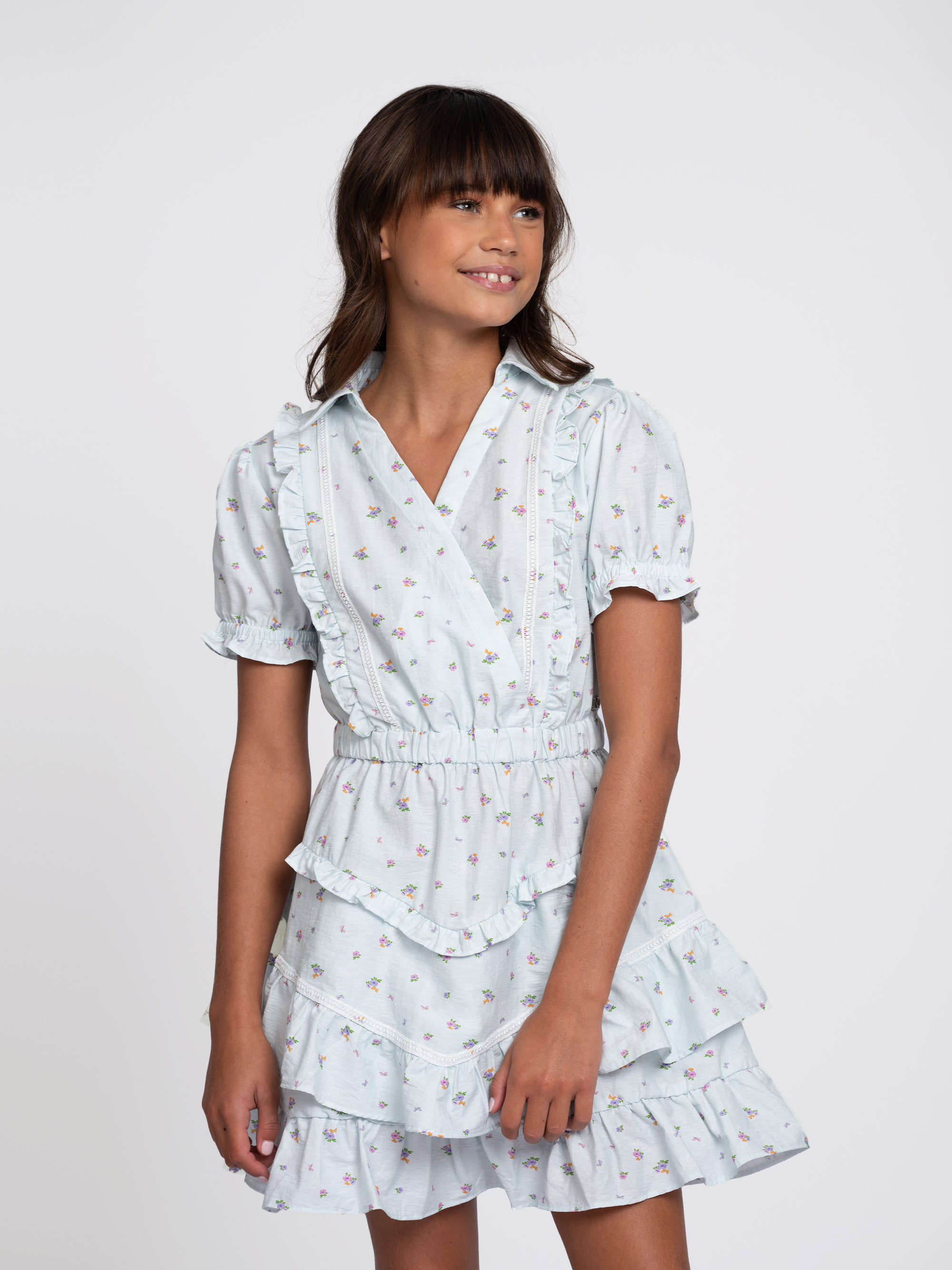 Layered dress with floral print and ruffles