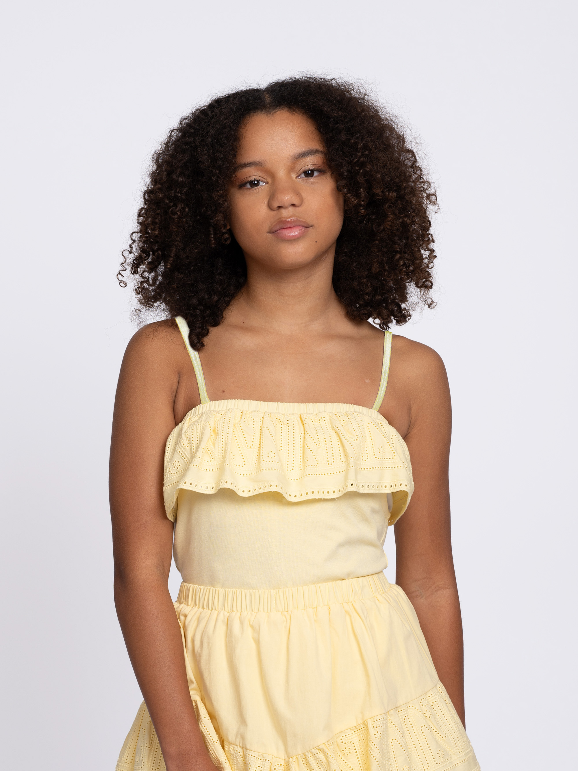 Top with flounce and embroidery