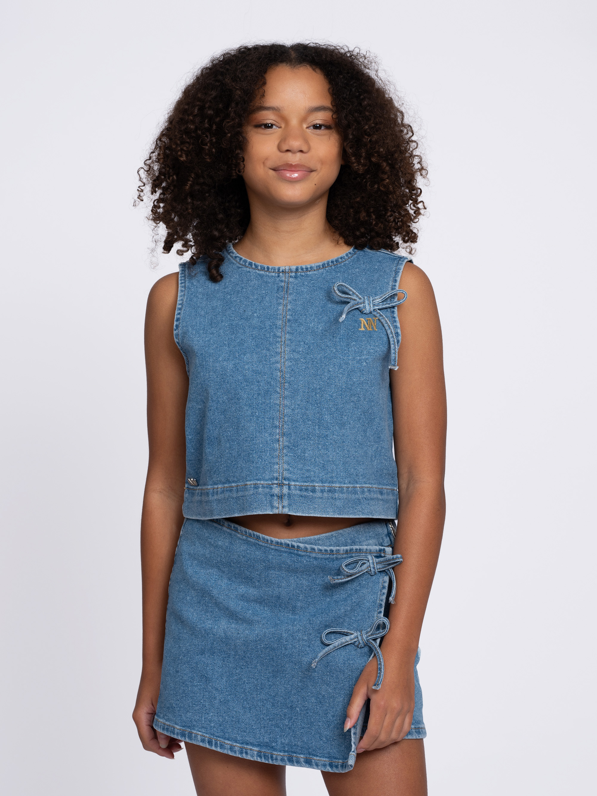 Denim skort met decoratieve strikjes