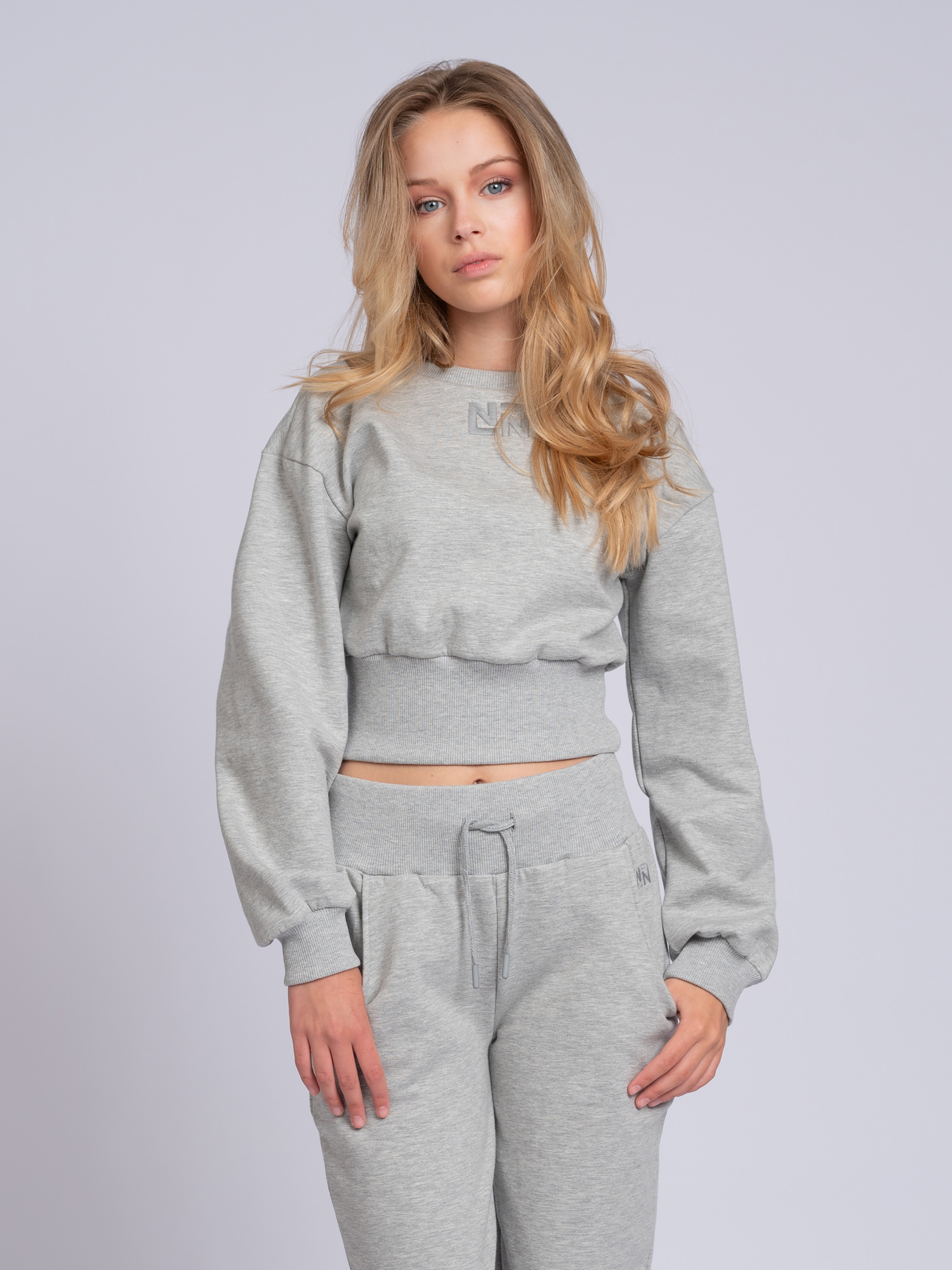 Cropped sweater met brede elastische tailleband