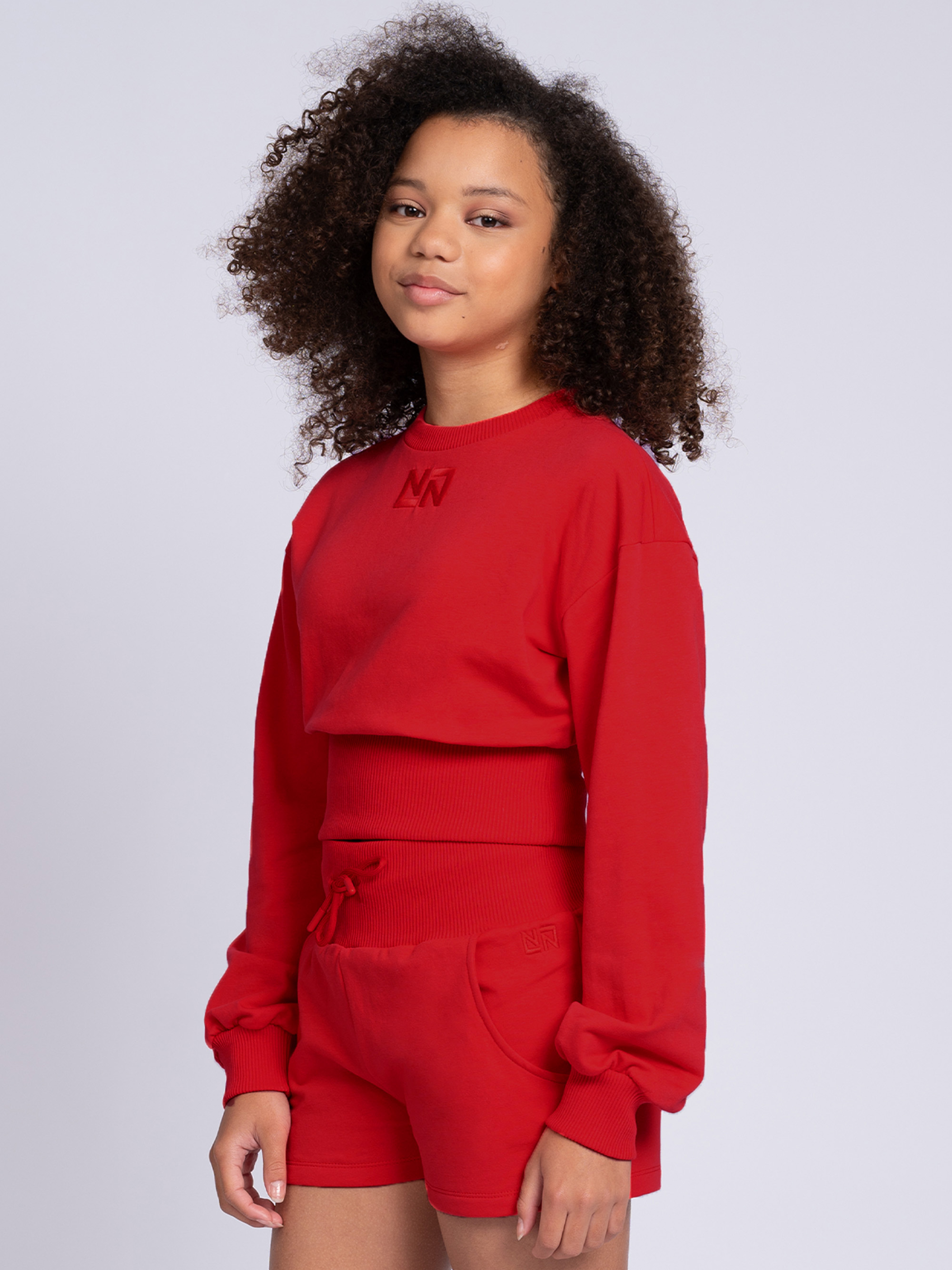 Cropped sweater met brede elastische tailleband