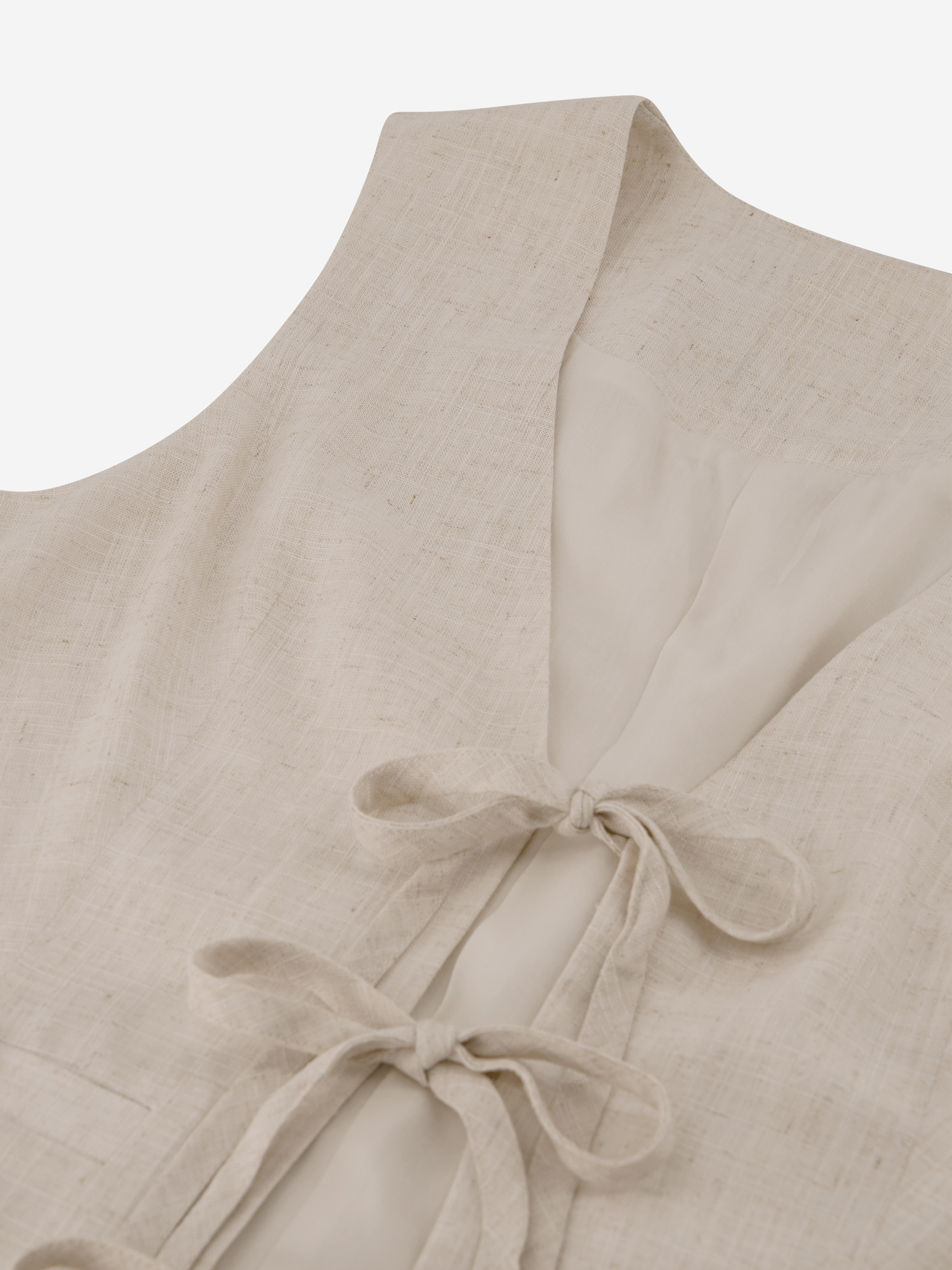 Gemêleerd gilet met strikdetails