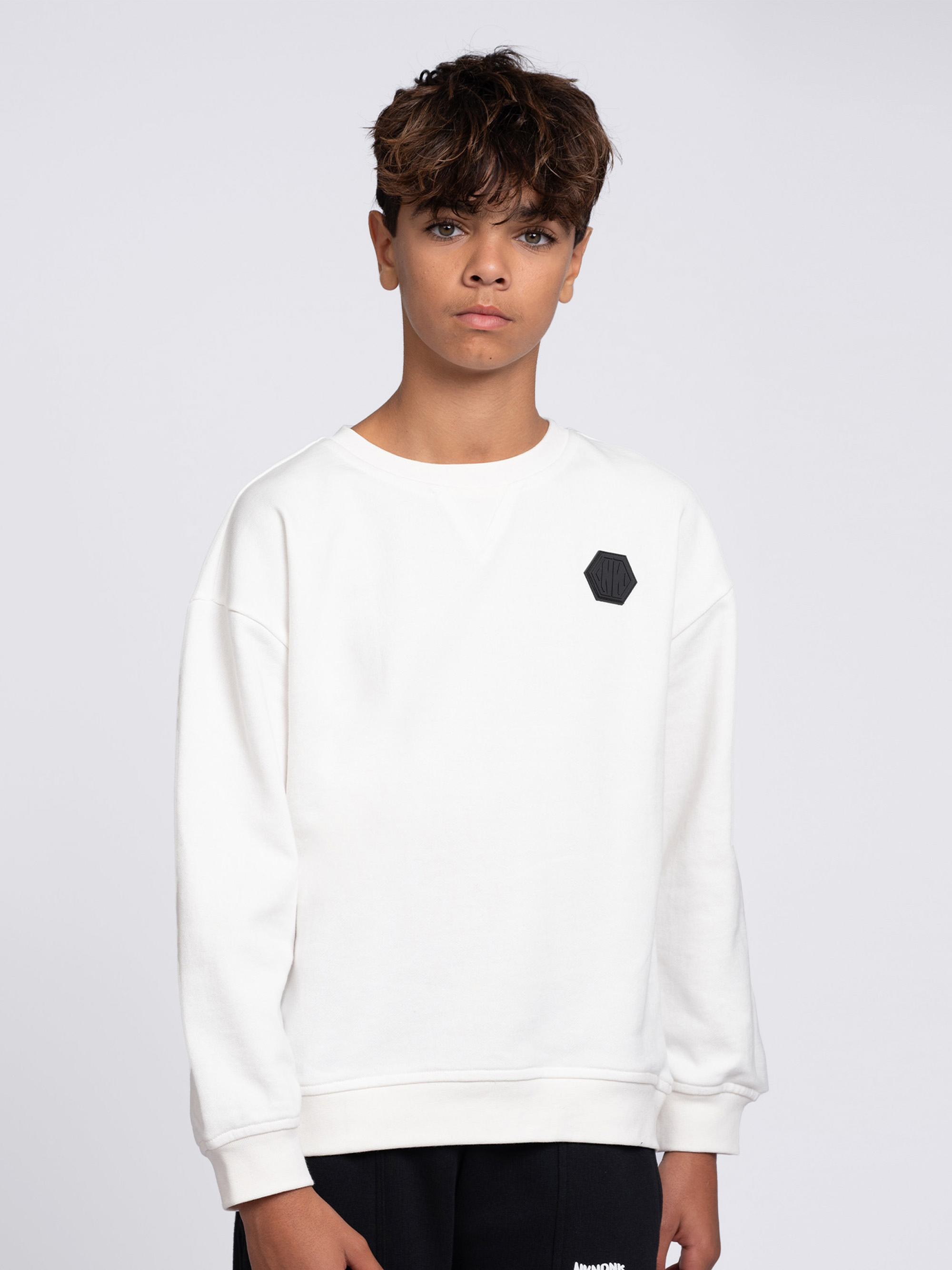 Oversized sweater met logo patch